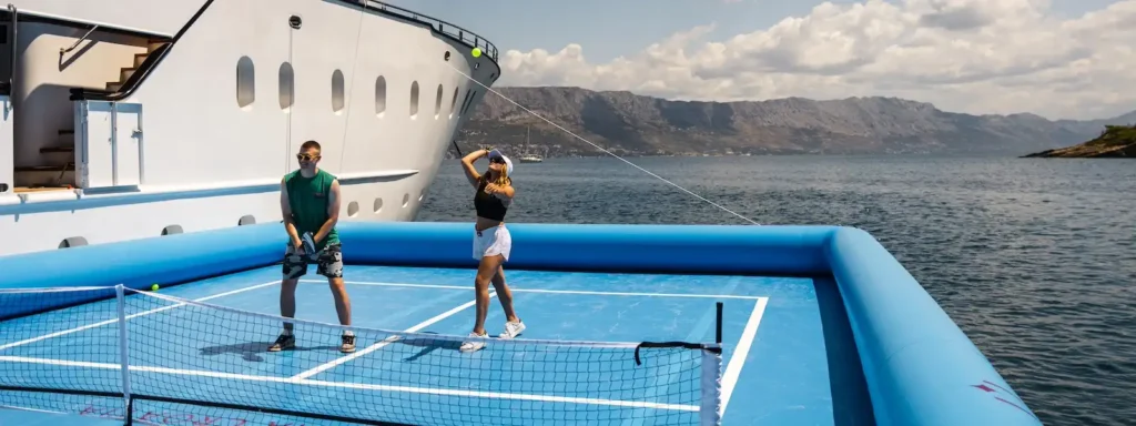 Two people on a Floating Pickleball Courts