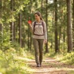 lady walking in the woods